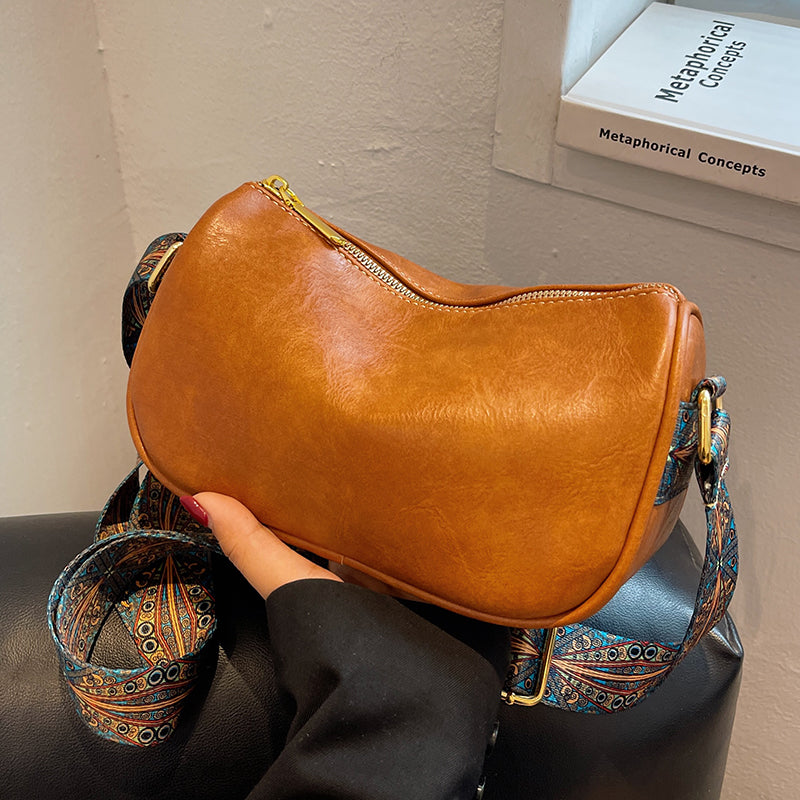 Bolso Dumpling de Hombro — Correa Estampada Ajustable